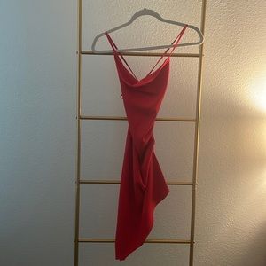 Red, midi sexy dress. Size small from “Native Daughters”. Crosses into the back.